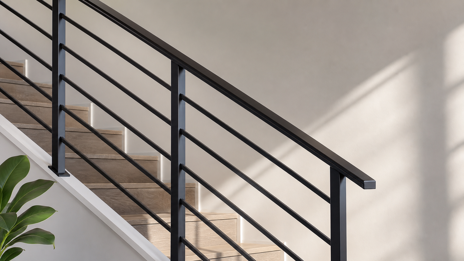 Beautifully painted and stained metal stair railing with a flawless finish in a modern home, showcasing expert painting contractor services